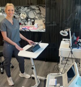 Cara Greer, CMLT, in a treatment room at Rejuvenate Renew med spa in Scottsdale, Arizona